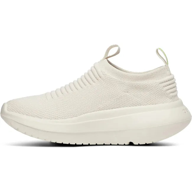 Medial side of Women&#39;s OOfos OOmy Zen Sneaker in Chalk off white