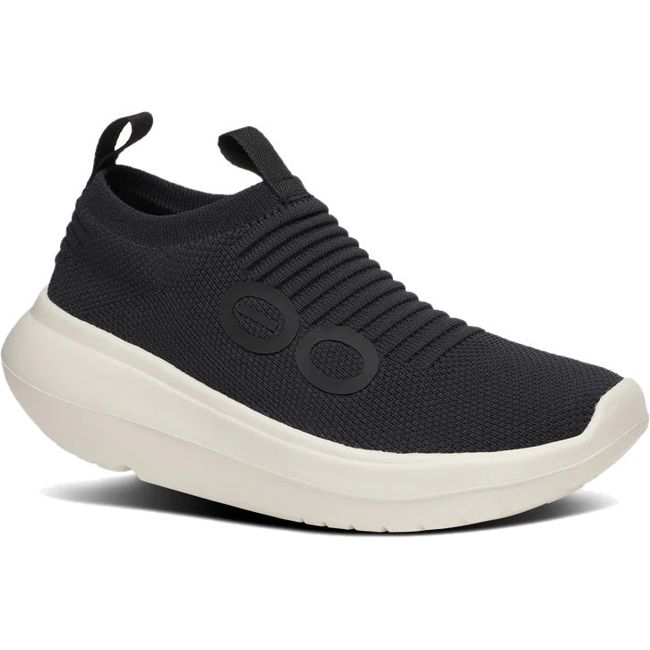 Front angled view of Women's OOfos OOmy Zen Sneaker in Black and Chalk white