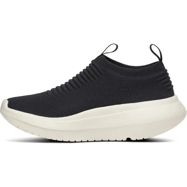 Medial side of Women&#39;s OOfos OOmy Zen Sneaker in Black and Chalk white