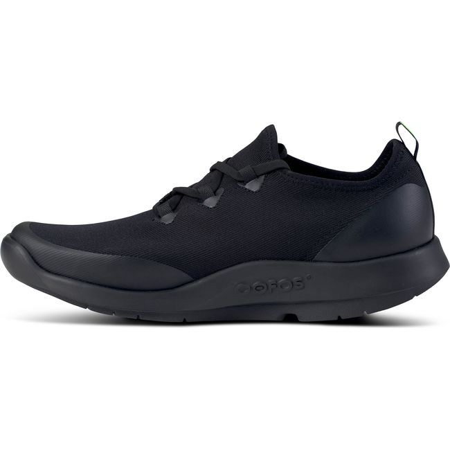 Medial side of lace up Men&#39;s OOFOS OOmg Sport LS Shoe in black mesh