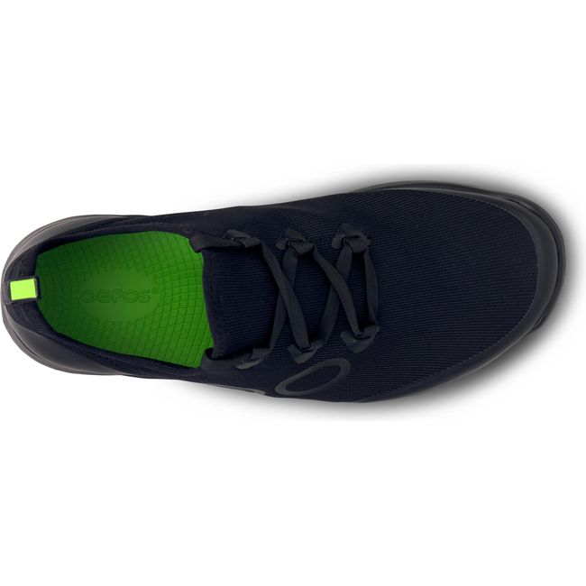 Top down view of lace up Men&#39;s OOFOS OOmg Sport LS Shoe in black mesh with neon green insole