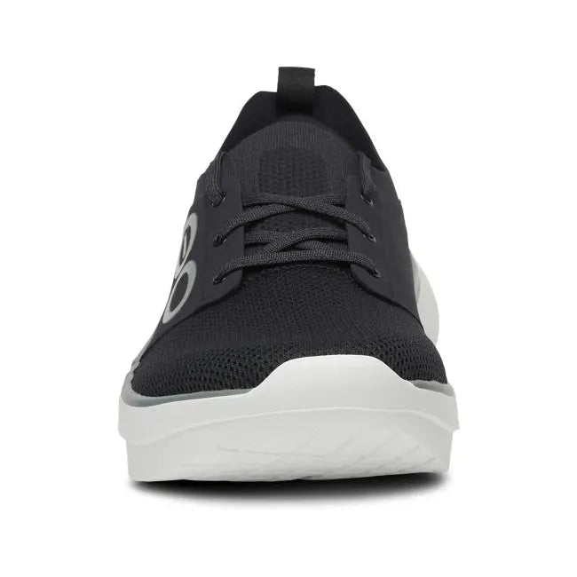 Front of Men's OOfos OOmy Stride Shoe in black and white