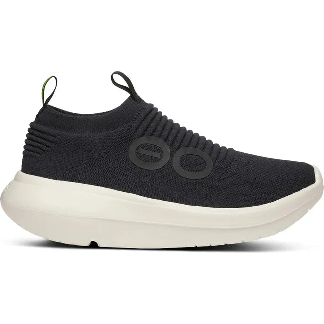 Lateral side of Men&#39;s OOfos OOmy Zen Sneaker in Black and Chalk white