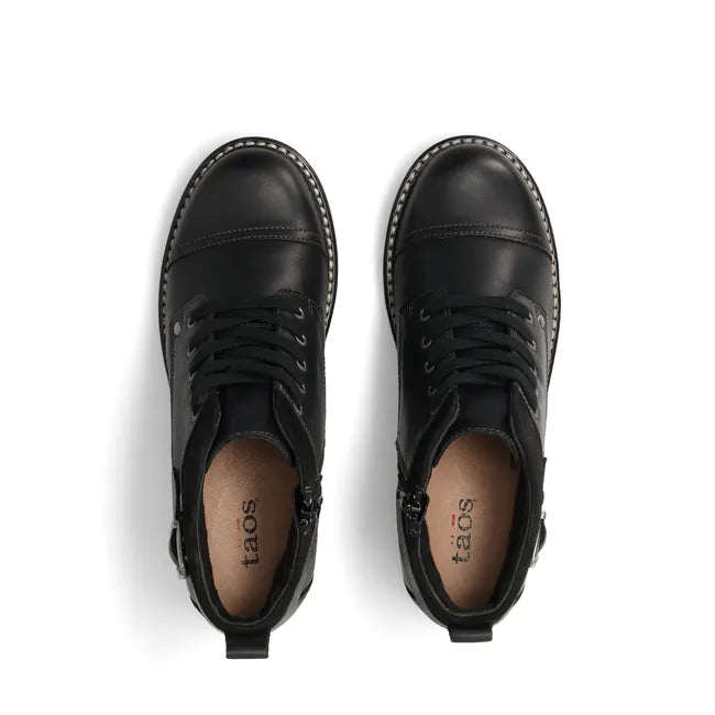 Top down view of Women's Taos Mini Crave Boot in black leather. Ankle height and lace up closure