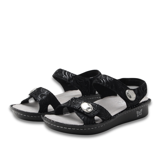 Pair of Alegria Women's Vienna Sandals in Swirling Black with velcro back straps