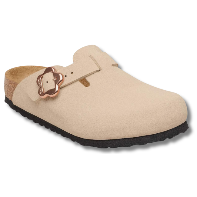 Angled side of Birkenstock Kids' Boston Birkibuc Flower Buckle Clog in Sandcastle Tan