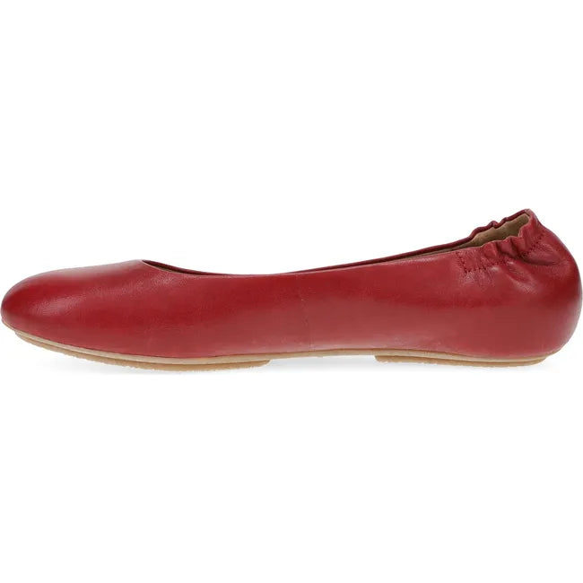 Medial side of Women's Dansko Mollie Ballet Flat in red leather