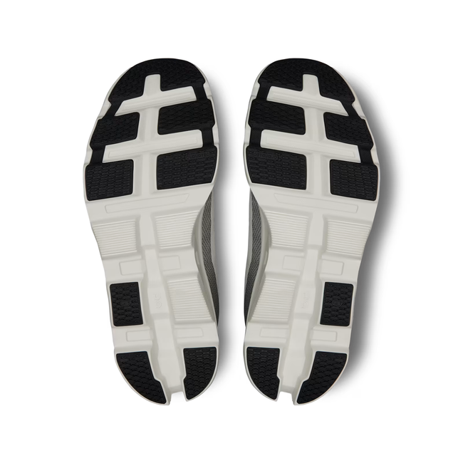 Soles of On Running Men's Cloudmonster 2 Running Shoes in Undyed White