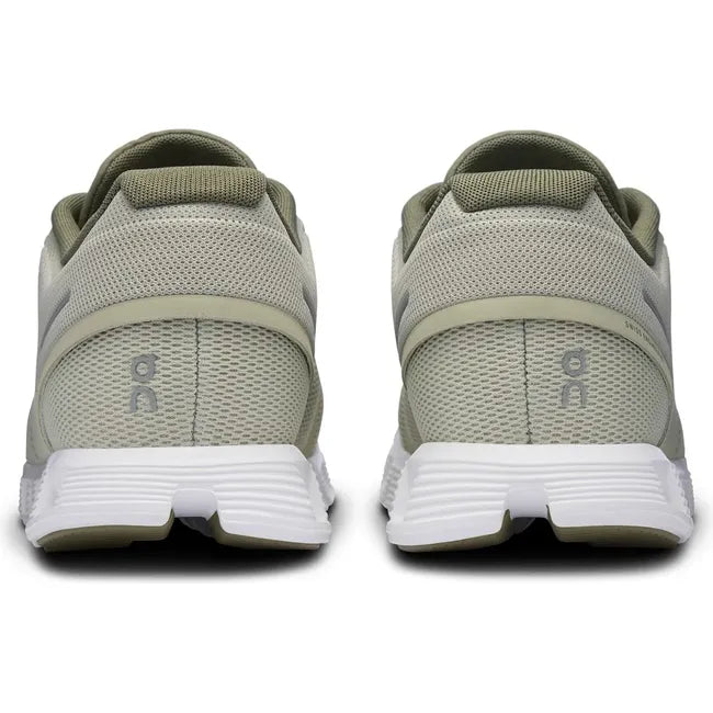 Heels of On Cloud 5 running shoes in a light green color with a white sole