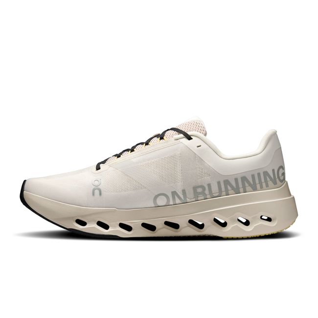 Medial side of On Running Women's Cloudsurfer Next Running Shoe in ivory beige and silver