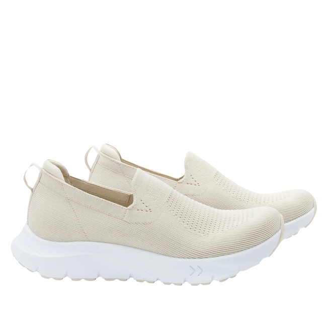 Lateral view of Women&#39;s Alegria Waze slip on shoes in sand color knit upper and white soles