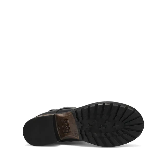 Sole of Women's Taos Crave Boot in black leather with black sole and block heel. Combat boot style.