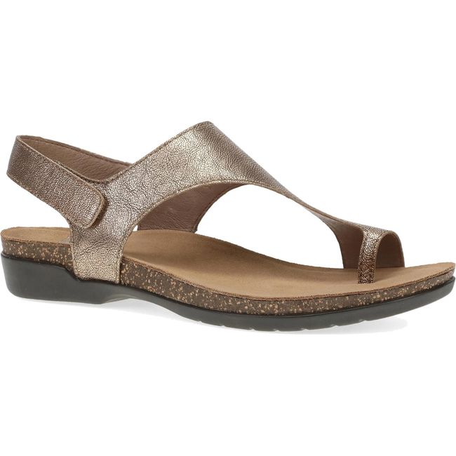Lateral side of Women's Dansko Reece Sandal in Bronze Metallic with a velcro backstrap