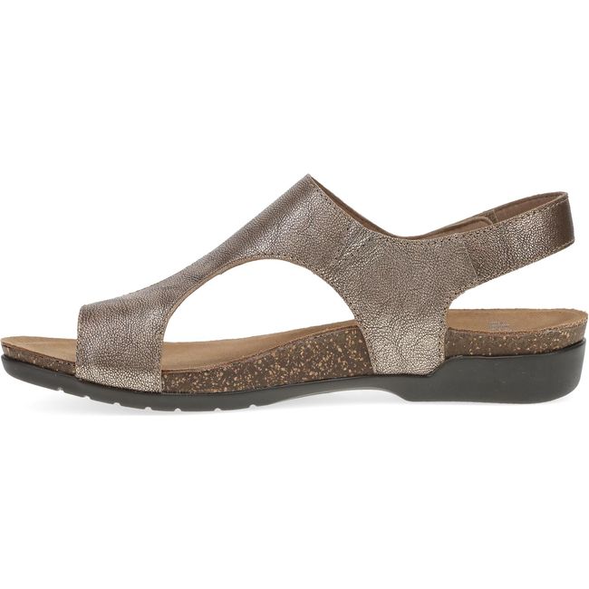 Medial side of Women's Dansko Reece Sandal in Bronze Metallic with a velcro backstrap