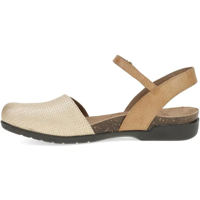 Dansko Women's Rowan Sandal in Taupe Metallic, side view showing the cork midsole