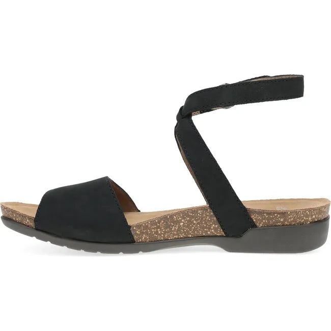 Medial side of Women's Dansko Rafferty Sandal in Black Milled Nubuck with velcro backstrap
