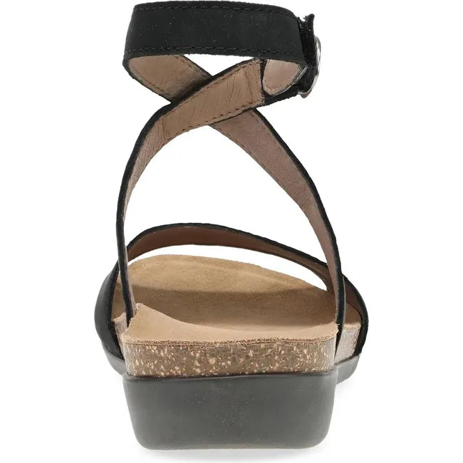 Heel of Women's Dansko Rafferty Sandal in Black Milled Nubuck with velcro backstrap