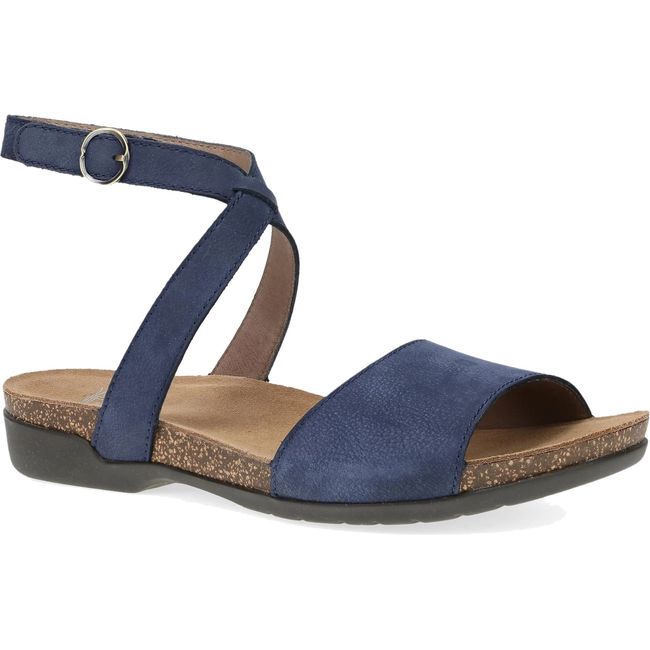 Lateral side of Women's Dansko Rafferty Sandal in Navy Milled Nubuck with velcro backstrap