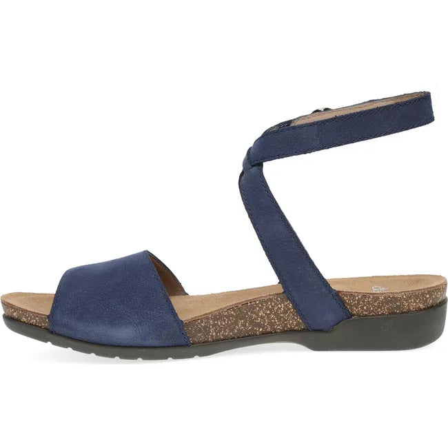 Medial side of Women's Dansko Rafferty Sandal in Navy Milled Nubuck with velcro backstrap