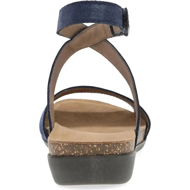 Heel of Women's Dansko Rafferty Sandal in Navy Milled Nubuck with velcro backstrap