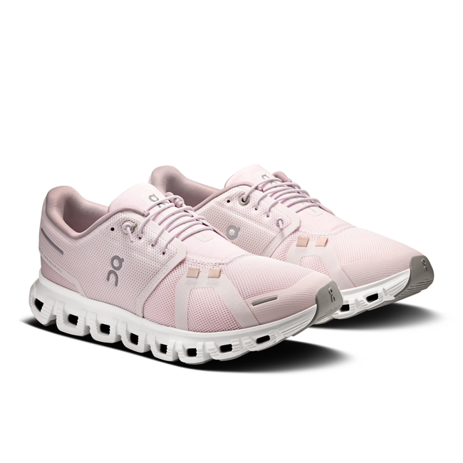 Angled pair of On Running Women's Cloud 6 Running Shoes in Orchid Pink