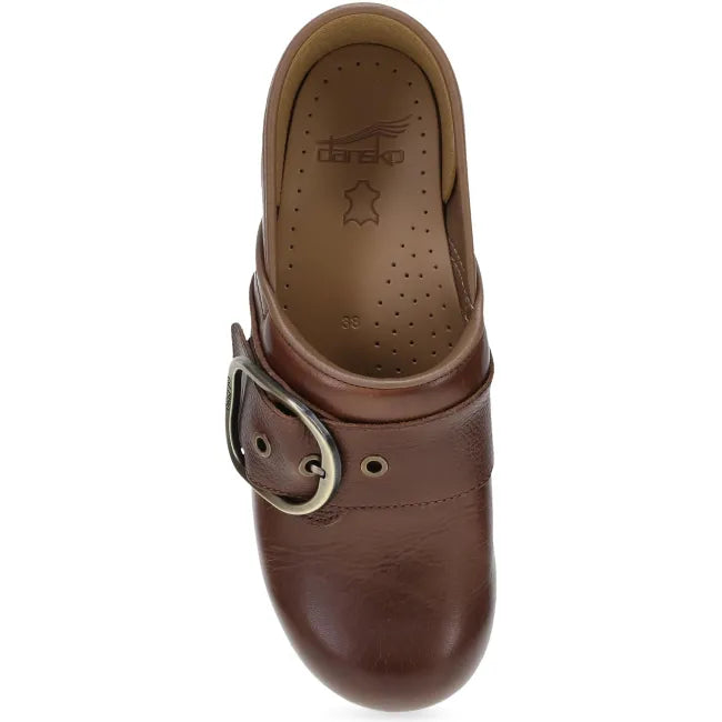 Dansko Pearson clog in brown waxy milled leather, top view showing decorative buckle