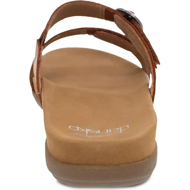 Heel of Women's Dansko Justine Sandal Slide in Luggage Calf brown leather with velcro straps