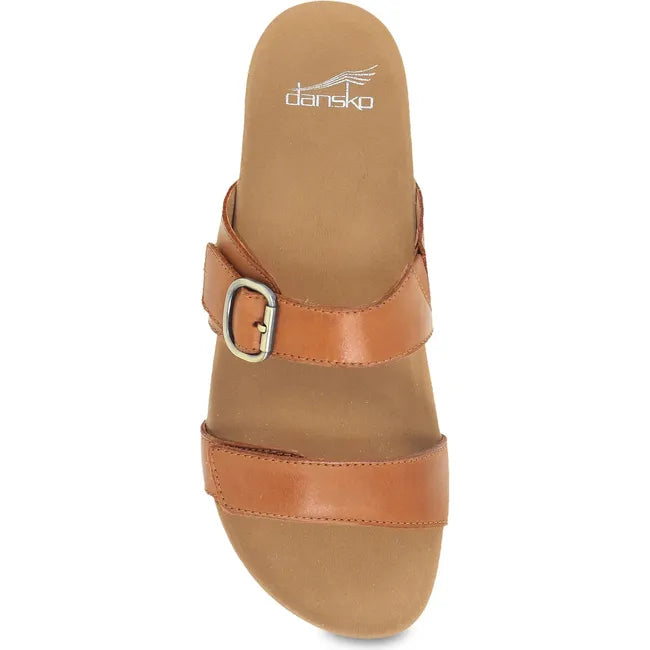 Top down view of Women's Dansko Justine Sandal in Luggage Calf brown leather with velcro straps
