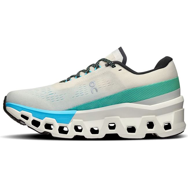 Medial side of On Running Women's Cloudmonster 2 Running Shoe in cream and horizon blue