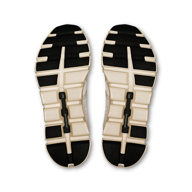 Soles of On Running Women's Cloud 6 Waterproof Running Shoe in Pearl Cream