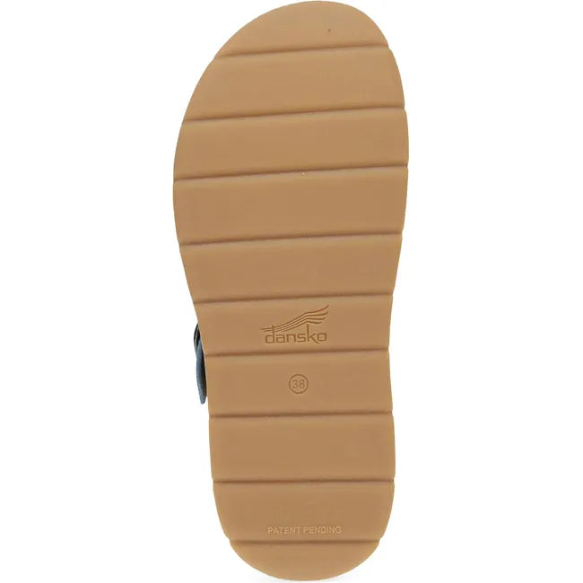 Sole of Women's Dansko Bianca Sandal in blue suede upper with tan outsole