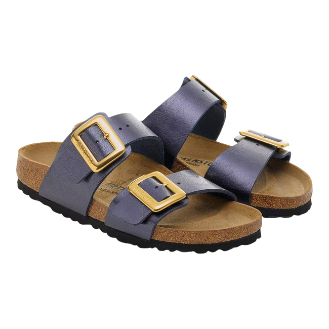 Angled pair of Birkenstock Women's Sydney Luxe Birko-Flor Sandal in Midnight Blue