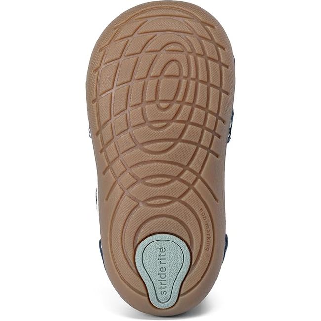 Brown sole of Stride Rite Kids' Waverly Sneaker in Vintage Indigo