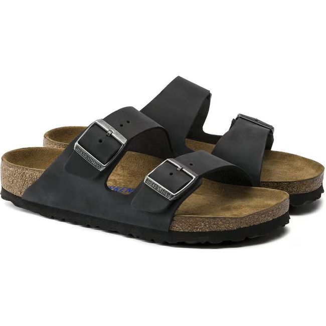 Pair of Birkenstock Unisex Arizona Soft Footbed Oiled Leather Sandals in black