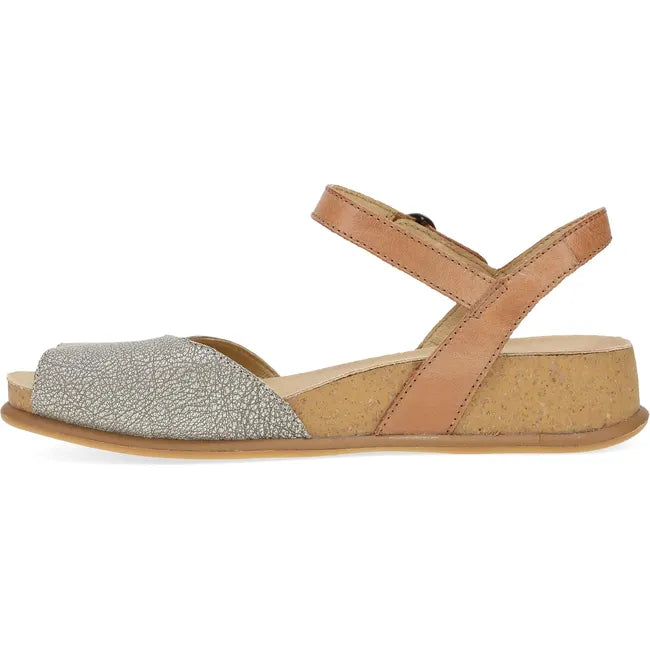 Medial side of Women's Dansko Cass Sandal in tan leather with velcro backstrap
