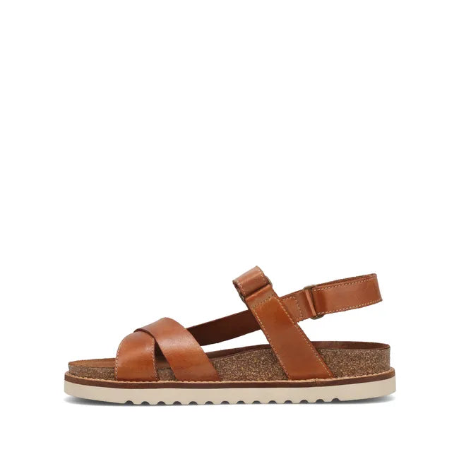 Medial side of Women's Taos Sideways Sandal in Caramel leather with velcro straps and cork midsole