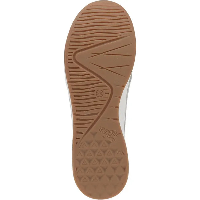 Sole of Women's Dansko Catie Sneaker in gray suede with tan gum bottom tread