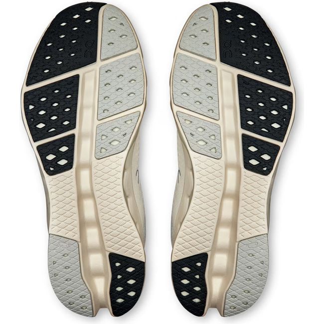 Soles of On Running Women's Cloudsurfer 2 Running Shoes in ivory