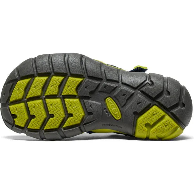 Sole of KEEN Little Kids Seacamp II CNX Sandal in Naval Academy blue and Chartreuse green