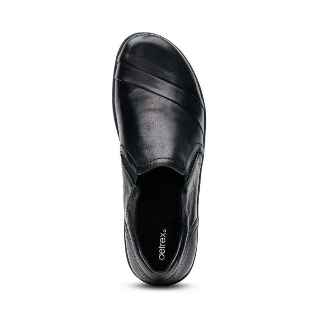 Upper of Aetrex Women's Helena Slip On Shoe in black leather