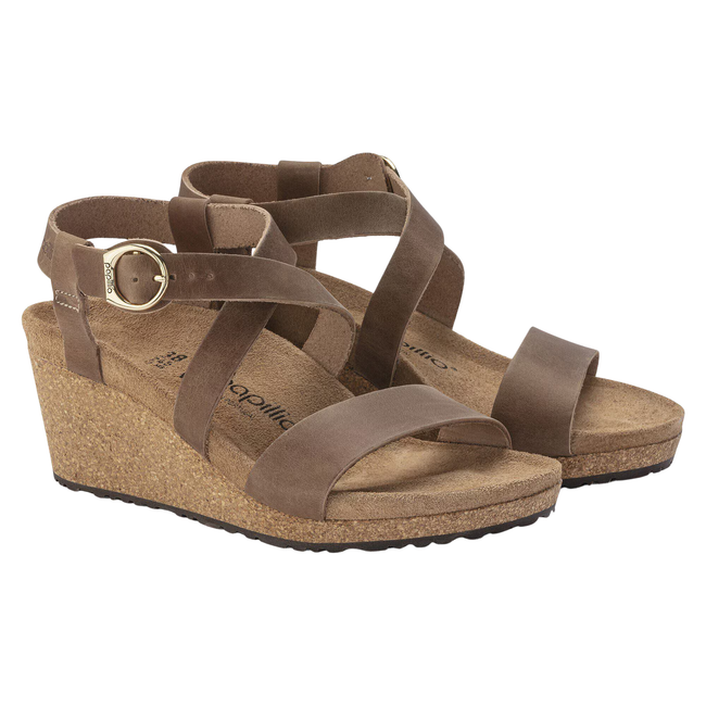 Angled Pair of Papillio By Birkenstock Women's Sibyl Ring-Buckle Sandal in Cognac Brown