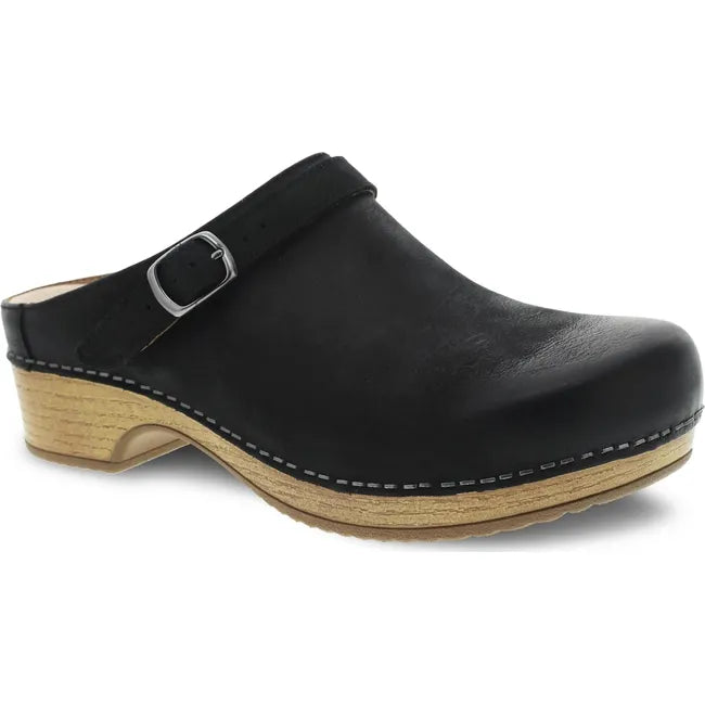 Lateral side of Women's Dansko Berry Clog in Black Burnished Nubuck