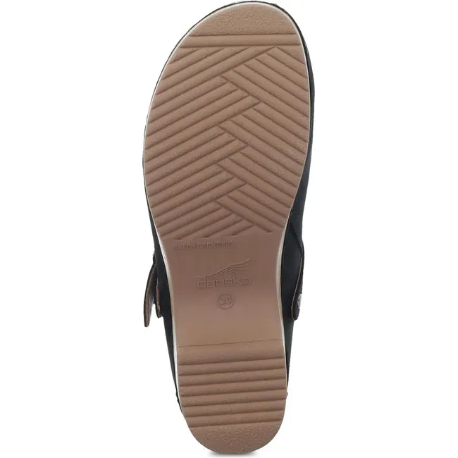 Sole of Women's Dansko Berry Clog in Black Burnished Nubuck
