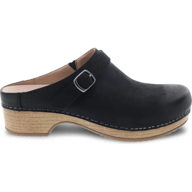 Medial side of Women's Dansko Berry Clog in Black Burnished Nubuck