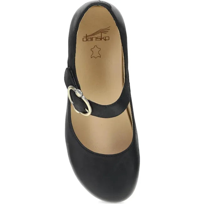 Dansko Bonny Mary Jane clog in black leather, top view showing instep strap and gold buckle