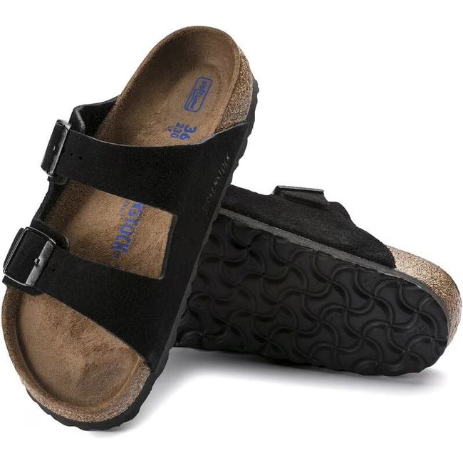 Pair of Birkenstock Arizona Soft Footbed Black Suede Sandals showing the sole and upper