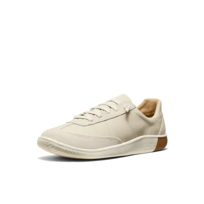 Front angled view of birch beige Women's KEEN KNX T-Toe slip on Sneaker