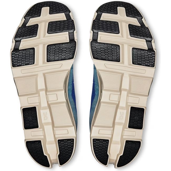 Soles of On Running Men's Cloudmonster 2 Running Shoes in temptest and horizon blue