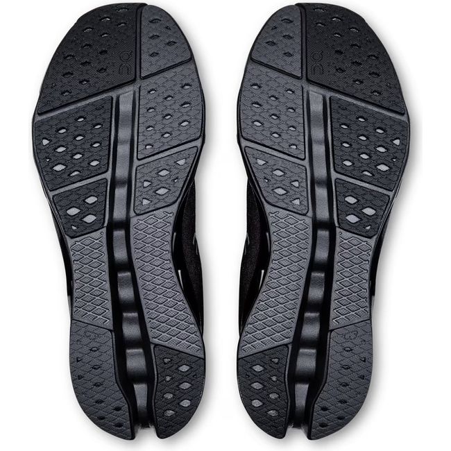 Soles of On Running Women's Cloudsurfer 2 Running Shoes in all black