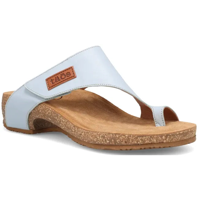 Front angled view of Women's Taos Loop Sandal in Light Blue Leather with velcro strap and toe post